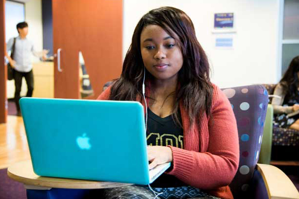 Emory Student Working on Laptop